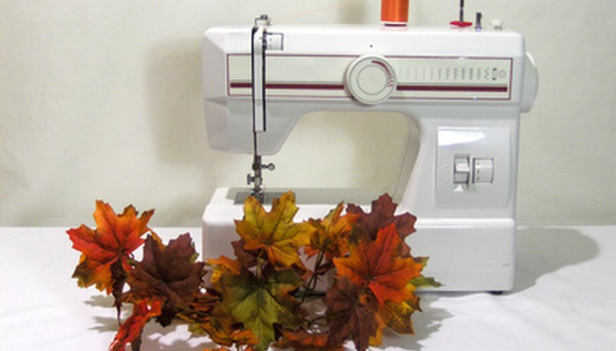 Photo Credit: sewing image by Leticia Wilson from <a href='http://www.fotolia.com'>Fotolia.com</a> Sew and tailor
