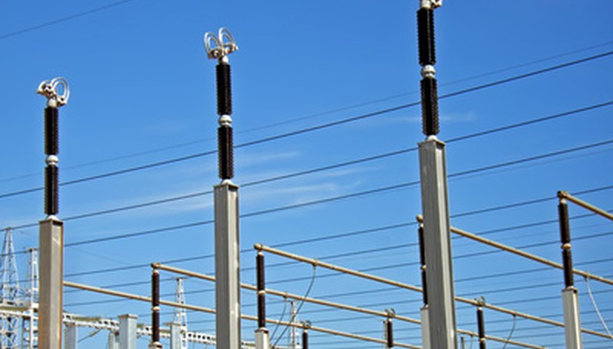 Photo Credit: Details of and electricity power plant image by JCVStock from <a href='http://www.fotolia.com'>Fotolia.com</a> Substations alter levels of voltage with the use of transformers.