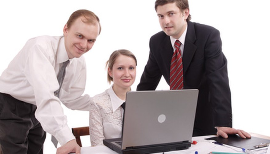 Photo Credit: technology computer image by Andrey Kiselev from <a href='http://www.fotolia.com'>Fotolia.com</a> Networking with auctioneers
