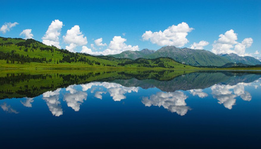 Photo Credit: Ideal reflection in lake image by Maxim Petrichuk from <a href='http://www.fotolia.com'>Fotolia.com</a> The ideal gas law describes the behavior of an ideal gas.