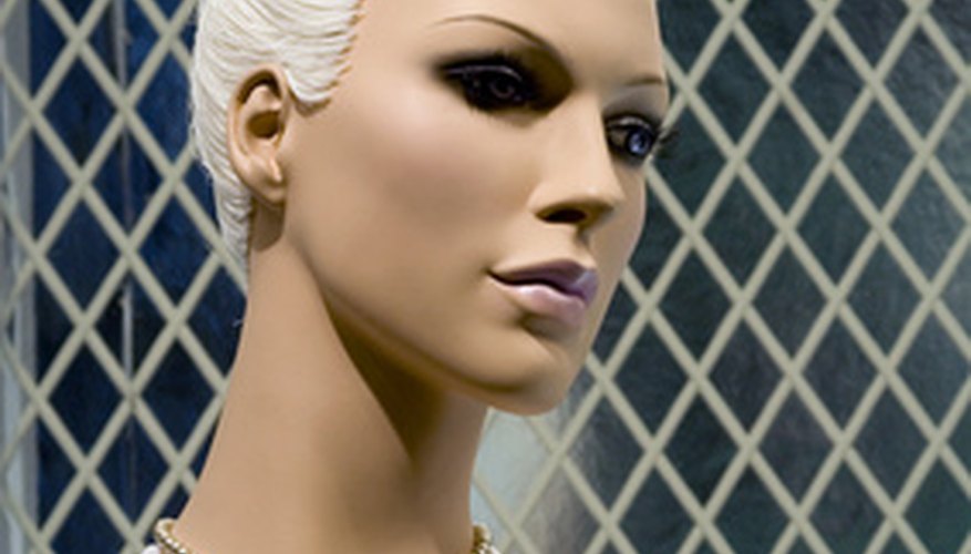 Photo Credit: mannequin image by FJ Medrano from <a href='http://www.fotolia.com'>Fotolia.com</a> Use flexible mannequins to position them in a variety of stances.