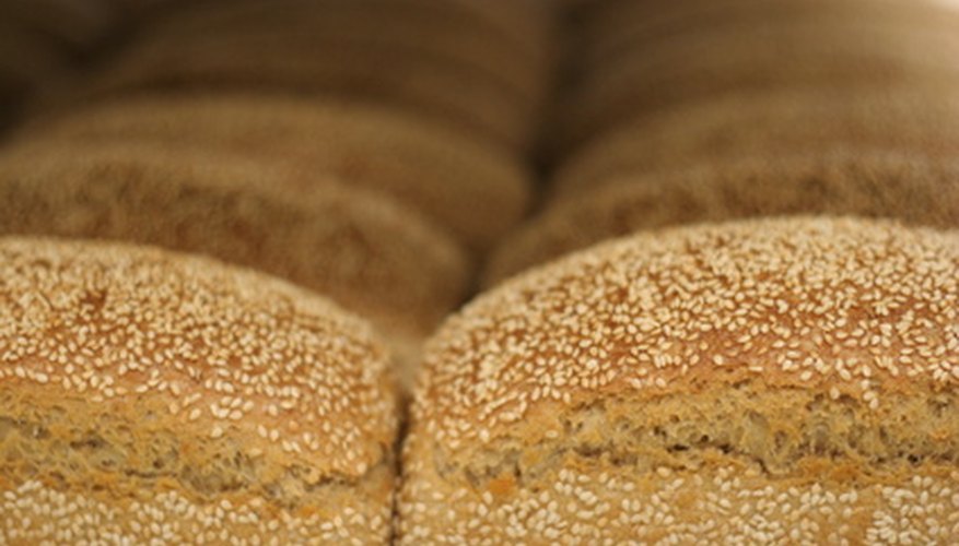 Photo Credit: Fresh Sesame Loaves - 4 image by velvetjam from <a href='http://www.fotolia.com'>Fotolia.com</a> Bread is a staple in the market basket survey.