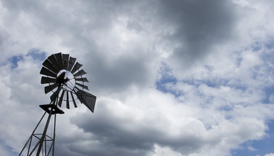 Photo Credit: windmill image by blaine stiger from <a href='http://www.fotolia.com'>Fotolia.com</a> Windmills are used for converting wind energy into electricity