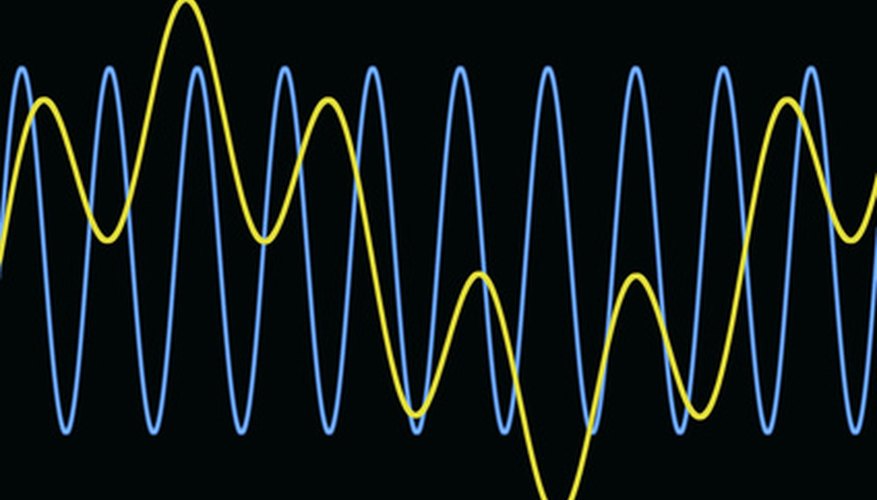 Photo Credit: harmonic waves diagram, background image by JoLin from <a href='http://www.fotolia.com'>Fotolia.com</a> Sound waves can be amplified by using some rather surprising objects.