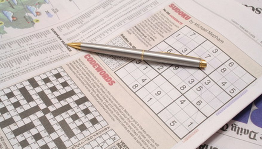 Photo Credit: newspaper crossword image by Christopher Hall from <a href='http://www.fotolia.com'>Fotolia.com</a> Playtime is