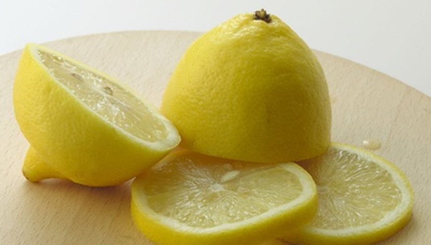 Photo Credit: lemon image by Maria Brzostowska from <a href='http://www.fotolia.com'>Fotolia.com</a> Lemons contain about 2.5% citric acid.