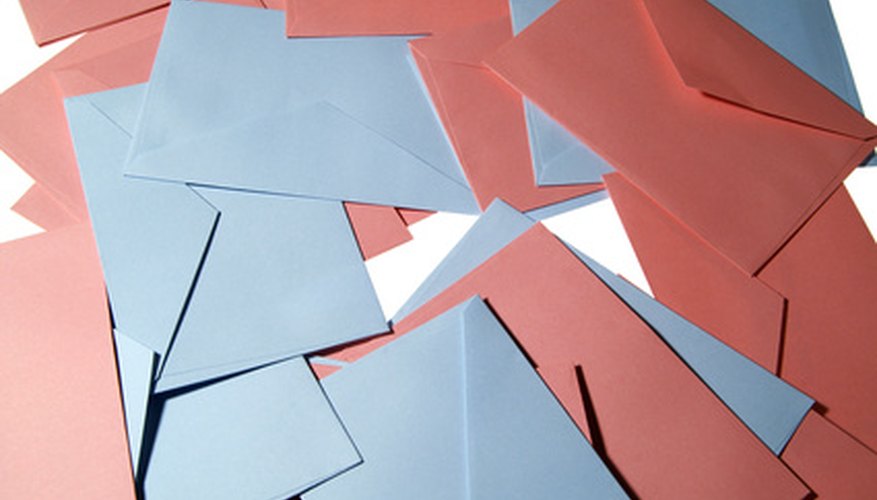 Photo Credit: enveloppes 5 image by thierry burot from <a href='http://www.fotolia.com'>Fotolia.com</a> Surveys can be conducted using phones and other mediums.