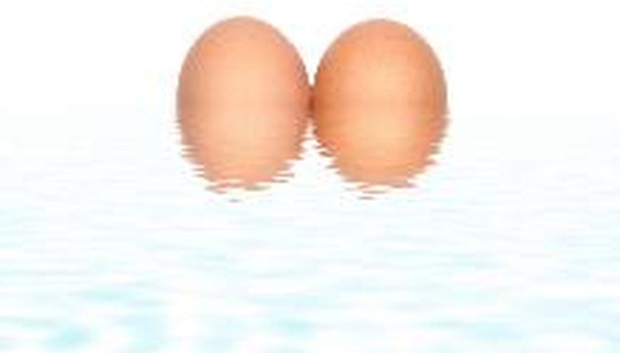 Photo Credit: Primal Elements image by marilyn barbone from <a href='http://www.fotolia.com'>Fotolia.com</a> Float eggs in salt water to challenge the concept of density with first-graders.
