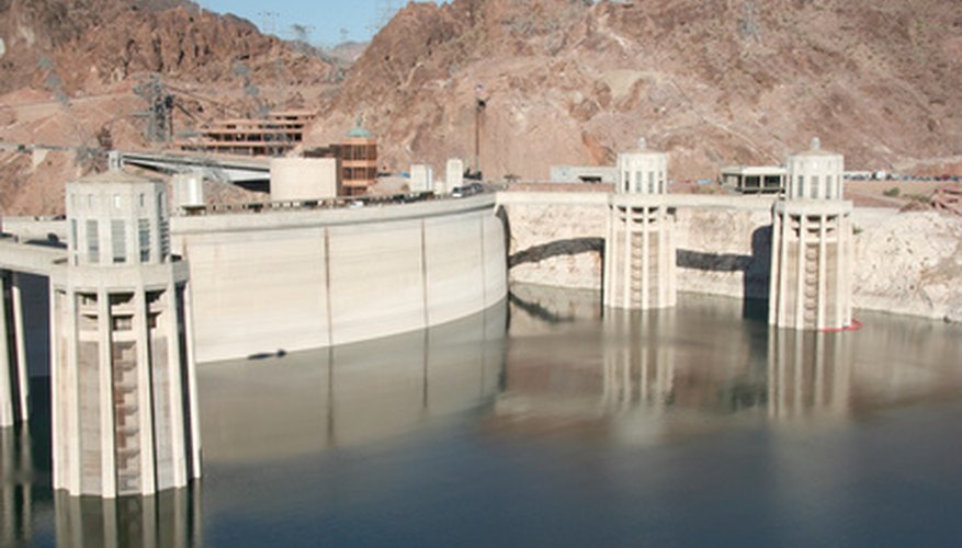 Photo Credit: hoover dam image by Dave from <a href='http://www.fotolia.com'>Fotolia.com</a> Hydroelectric plants transform potential energy of water into electricity.