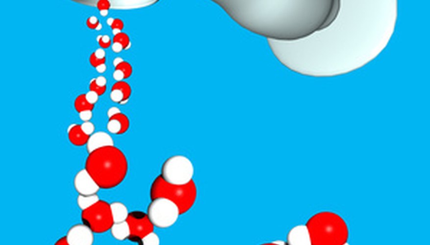 Photo Credit: eau image by Rémi BORNET from <a href='http://www.fotolia.com'>Fotolia.com</a> Water molecules like to stick together.