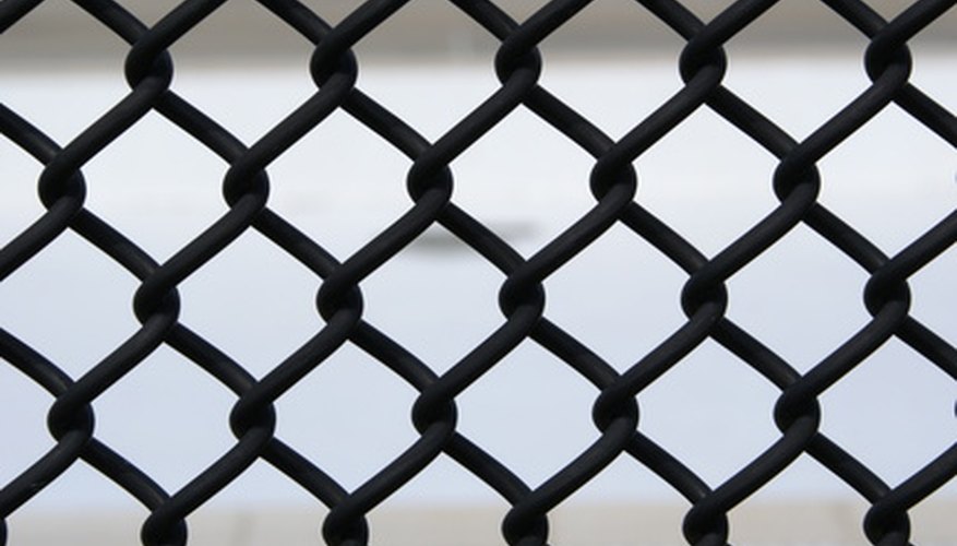 Plastic-coated chain link is becoming more common. Plastic-coated chain link is becoming more common.