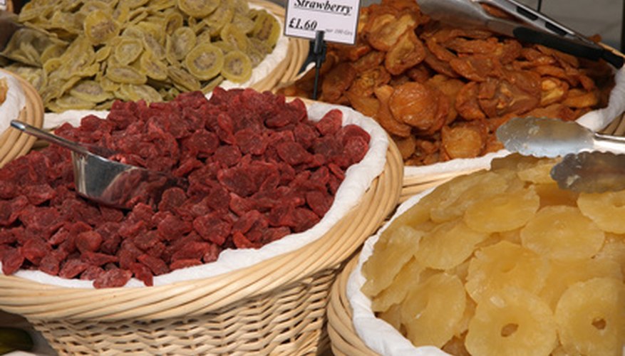 Photo Credit: dried strawberry, kiwi, figs and pineapple image by Elena Moiseeva from <a href='http://www.fotolia.com'>Fotolia.com</a> Dehydrating fruit is an exciting science fair project.