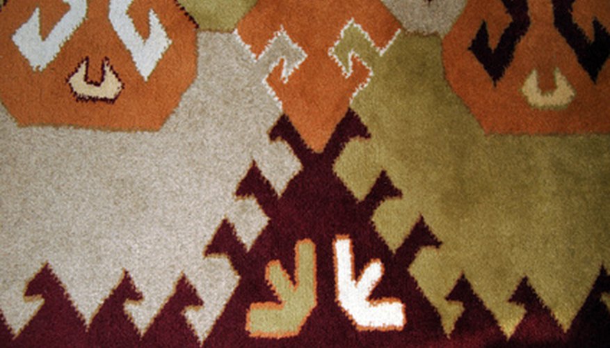 Put up a wall hanging to cover the fireplace. Put up a wall hanging to cover the fireplace.