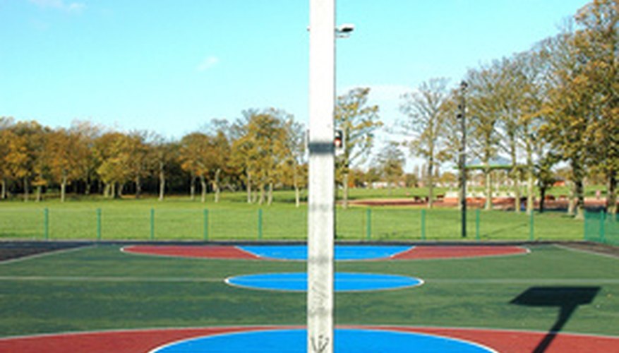 Photo Credit: basketball court image by Warren Millar from <a href='http://www.fotolia.com'>Fotolia.com</a> Make your own model of a mini-basketball court.