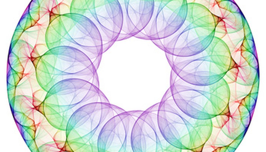 Photo Credit: circle circle image by Yurok Aleksandrovich from <a href='http://www.fotolia.com'>Fotolia.com</a> Create complex geometric designs with string art.