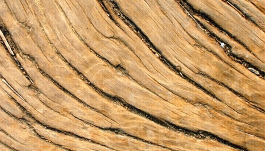 Wooden doors tend to warp and split. Wooden doors tend to warp and split.
