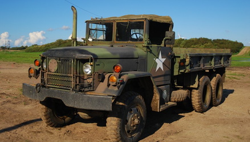 Photo Credit: Truck image by Jakub Niezabitowski from <a href='http://www.fotolia.com'>Fotolia.com</a> The Surface Deployment and Distribution Command is the link between military shippers and private freight carriers.