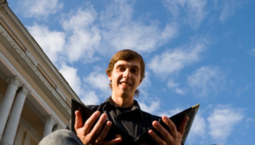 Photo Credit: student image by Stanislav Komogorov from <a href='http://www.fotolia.com'>Fotolia.com</a> It's vital to learn Spanish.