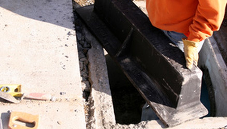 Photo Credit: sewer construction image by Greg Pickens from <a href='http://www.fotolia.com'>Fotolia.com</a> Workers may need to access your property.