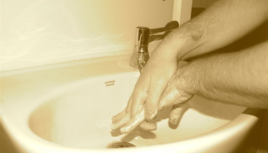 Photo Credit: washing hands image by JASON WINTER from <a href='http://www.fotolia.com'>Fotolia.com</a> Hand sinks must be provided in each bar area.