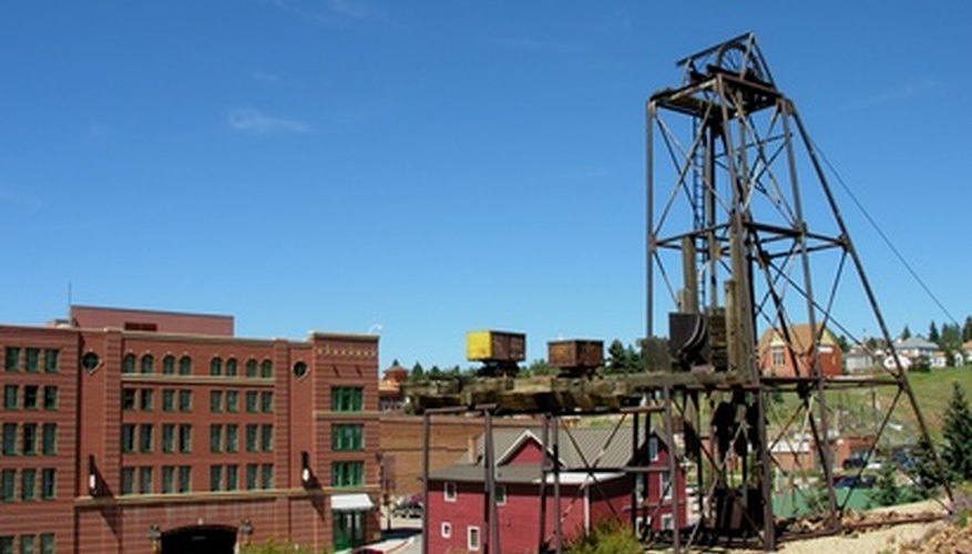 Photo Credit: an old gold mining town image by Tom Oliveira from <a href='http://www.fotolia.com'>Fotolia.com</a> Gold mining for beginners: How to start a gold mine