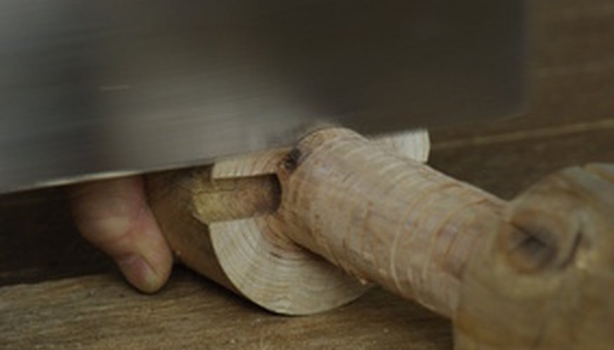 Hand saws can cut wood for wood piles. Hand saws can cut wood for wood piles.