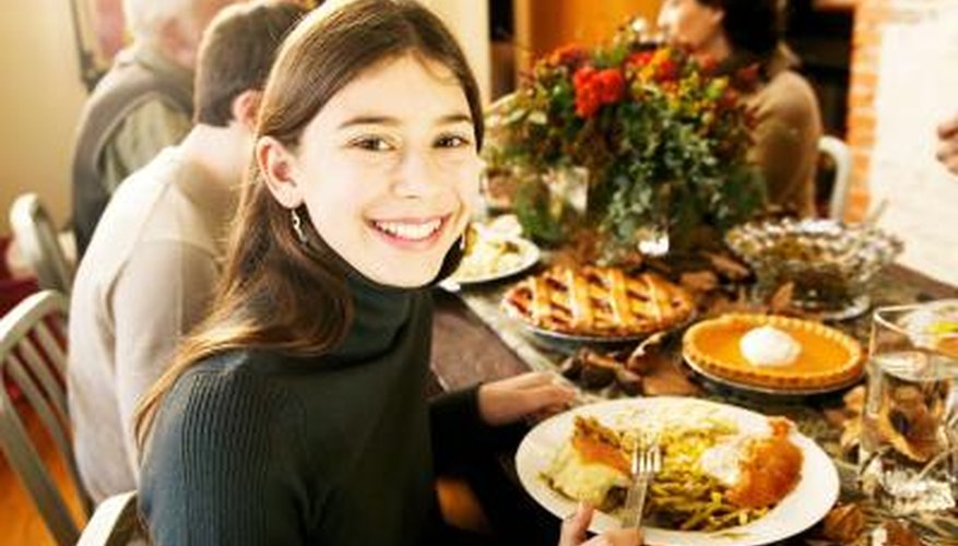 Make your dining room table big enough to fit a large group. Make your dining room table big enough to fit a large group.
