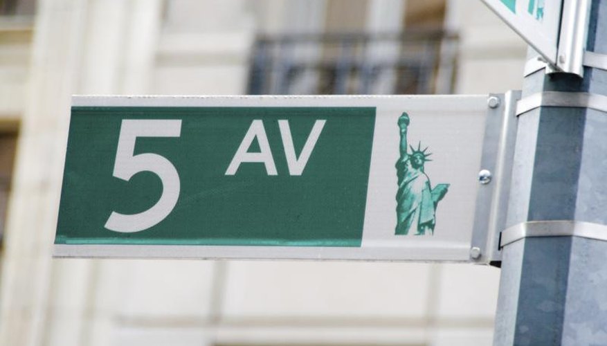 Fifth Avenue street sign with Statue of Liberty Fifth Avenue street sign with Statue of Liberty