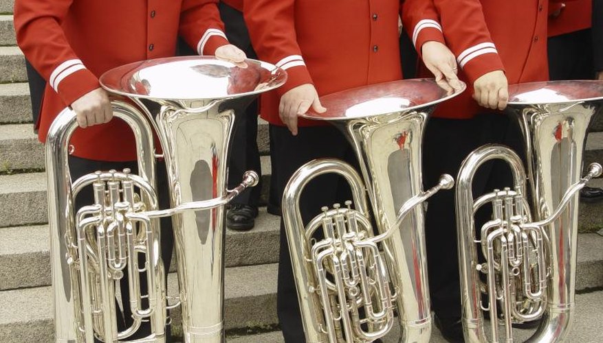 Tuba players in a marching band.