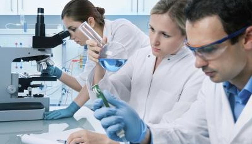 Photo Credit: Alexander Raths/iStock/Getty Images scientists in chemical laboratory