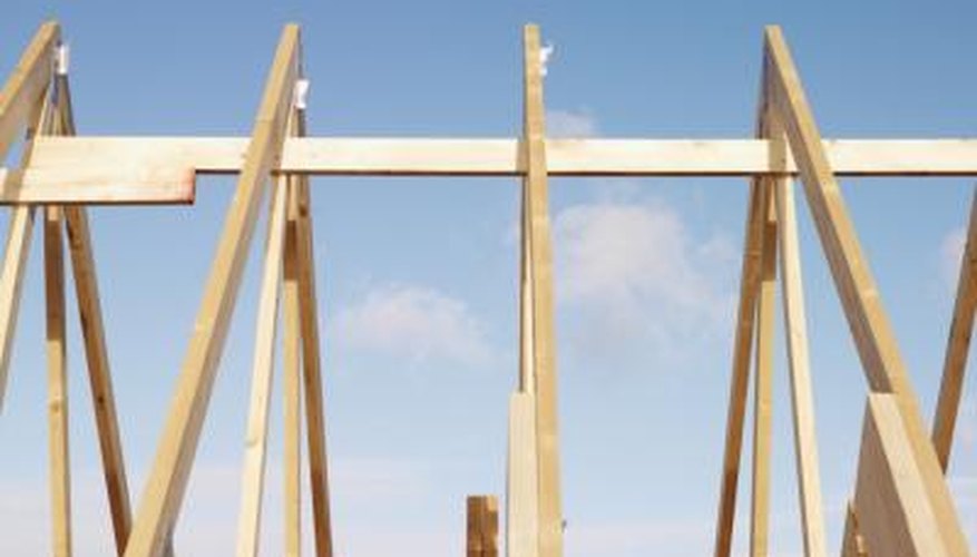 A framing square makes it easy to figure out how long rafters need to be for a project. A framing square makes it easy to figure out how long rafters need to be for a project.