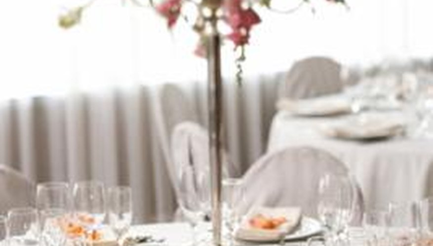 Tall and skinny centerpieces are dramatic. Tall and skinny centerpieces are dramatic.