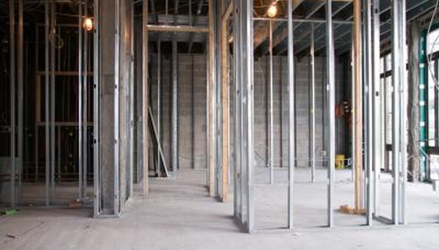 Like wood stud walls, metal stud walls consist of upright framing members joined at the top and bottom to horizontal framing members. Like wood stud walls, metal stud walls consist of upright framing members joined at the top and bottom to horizontal framing members.