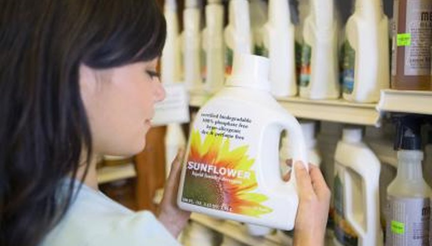 Photo Credit: Jupiterimages/Creatas/Getty Images Woman looking at laundry detergent.