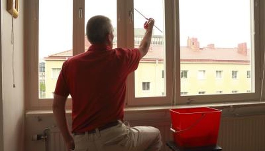 Man cleaning windows Man cleaning windows