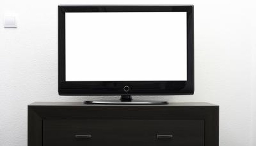 Paint the stand contemporary high-gloss black to match the TV. Paint the stand contemporary high-gloss black to match the TV.
