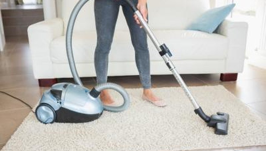 Vacuuming home. Vacuuming home.
