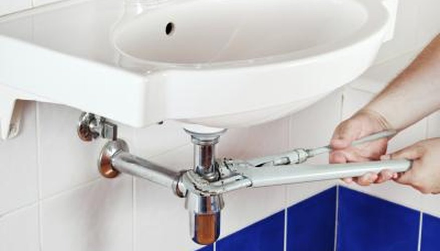 Reattach the cleaned trap to the drain pipes under the sink. Reattach the cleaned trap to the drain pipes under the sink.
