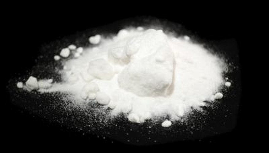 Photo Credit: Vitali Dyatchenko/iStock/Getty Images Baking soda on black background.
