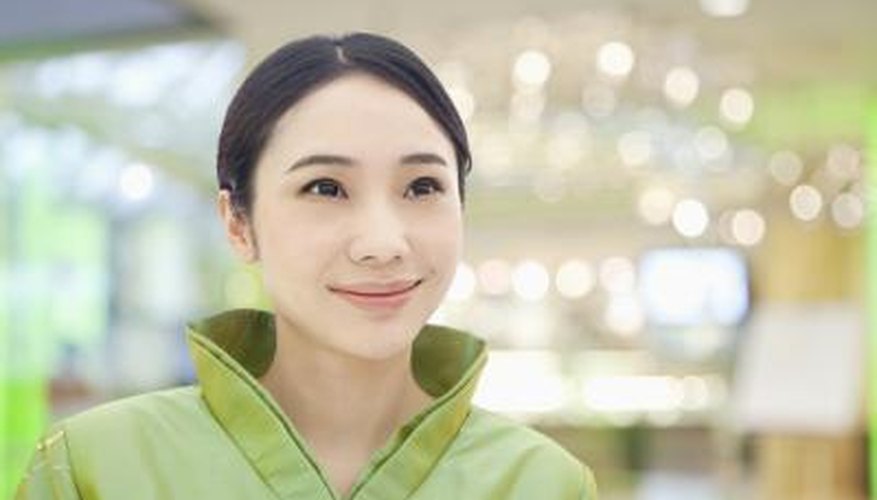 Photo Credit: XiXinXing/iStock/Getty Images Hostest at restaurant