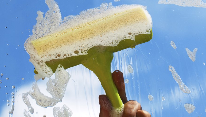 Scrub dirt with a sponge. Scrub dirt with a sponge.