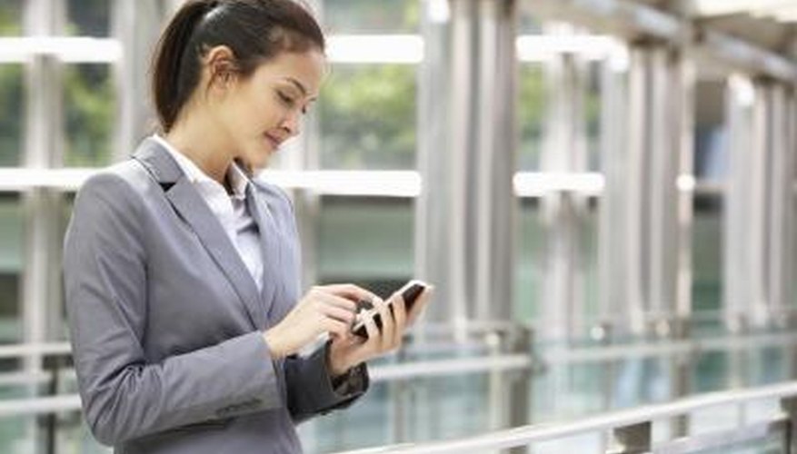 Photo Credit: Catherine Yeulet/iStock/Getty Images public relations specialist checking her email