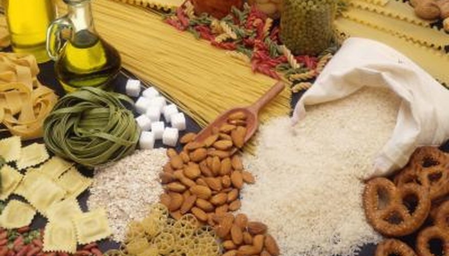 Weevils live in packages of dry goods, such as rice, pasta and cereal. Weevils live in packages of dry goods, such as rice, pasta and cereal.