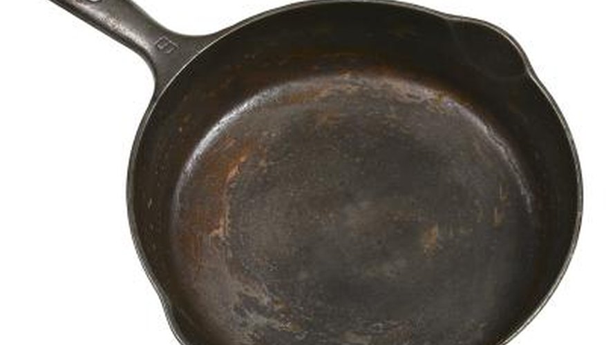 Avoid scrubbing residue from cast iron pans, as this will affect their seasoning. Avoid scrubbing residue from cast iron pans, as this will affect their seasoning.