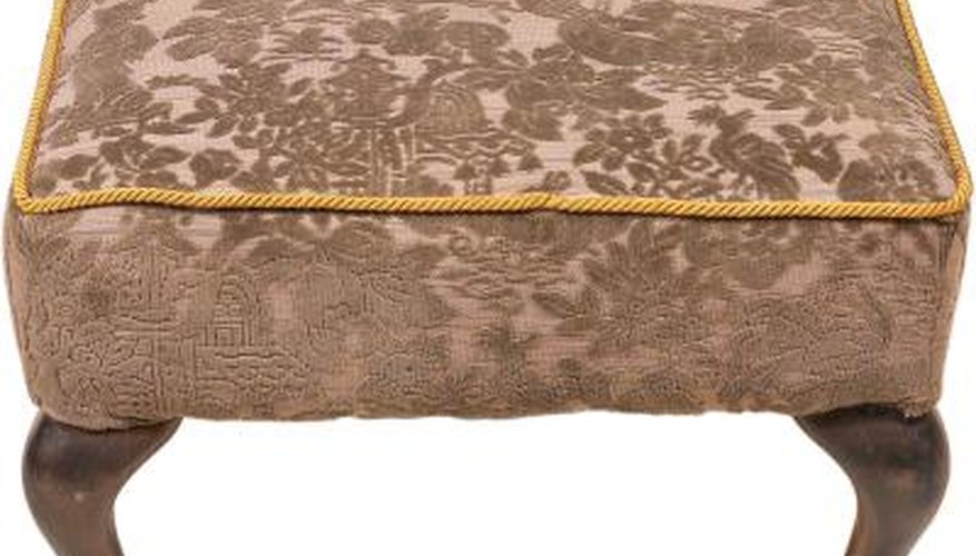 Simple pieces of furniture, like footstools, make reupholstering easy. Simple pieces of furniture, like footstools, make reupholstering easy.