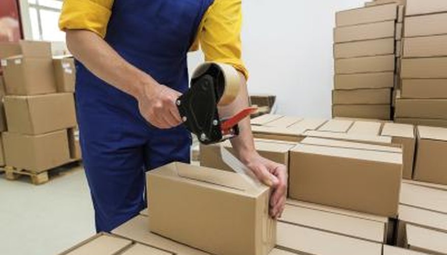 Photo Credit: KatarzynaBialasiewicz/iStock/Getty Images Worker packaging products for sale