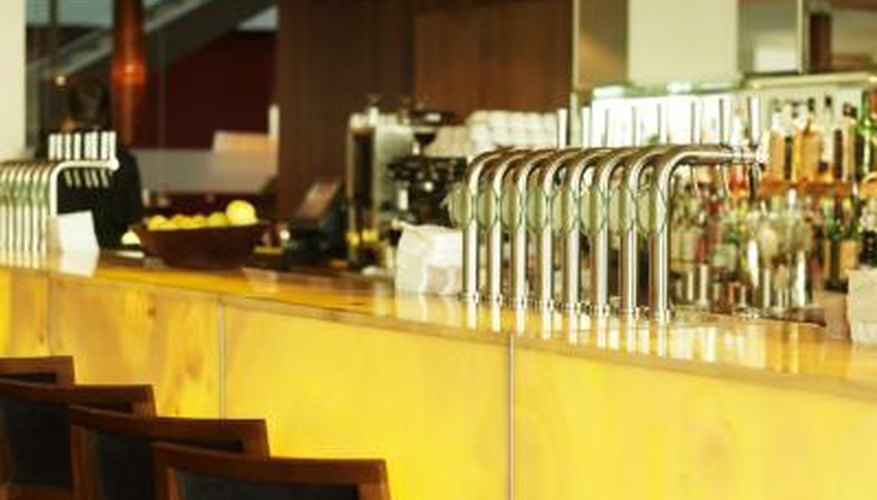Photo Credit: George Doyle/Stockbyte/Getty Images Search for a bar or restaurant supply company in your local area and inquire about purchasing a fountain drink machine.