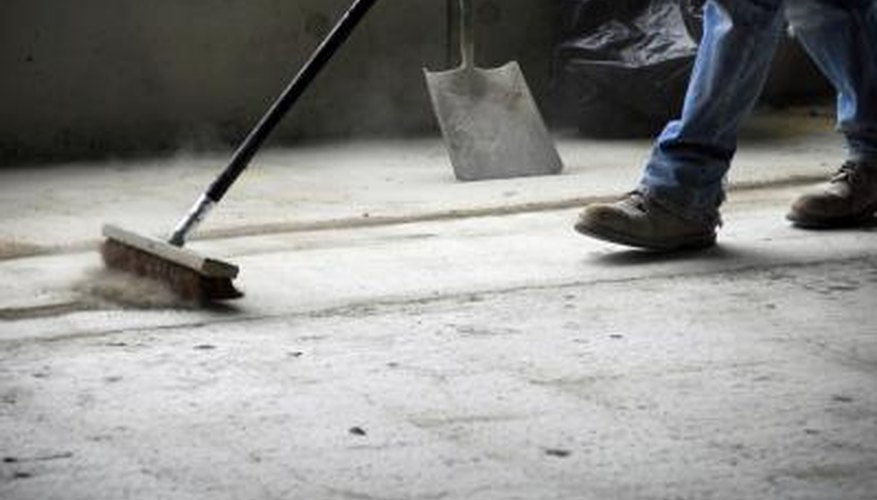 Photo Credit: Anthony Hall/iStock/Getty Images Construction site gets swept