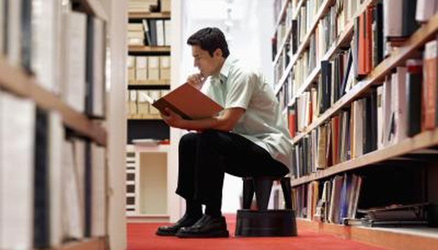 Man reading manual. Man reading manual.