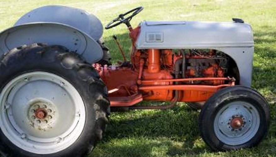 Injectors spray diesel into the cylinders of a tractor's engine. Injectors spray diesel into the cylinders of a tractor's engine.